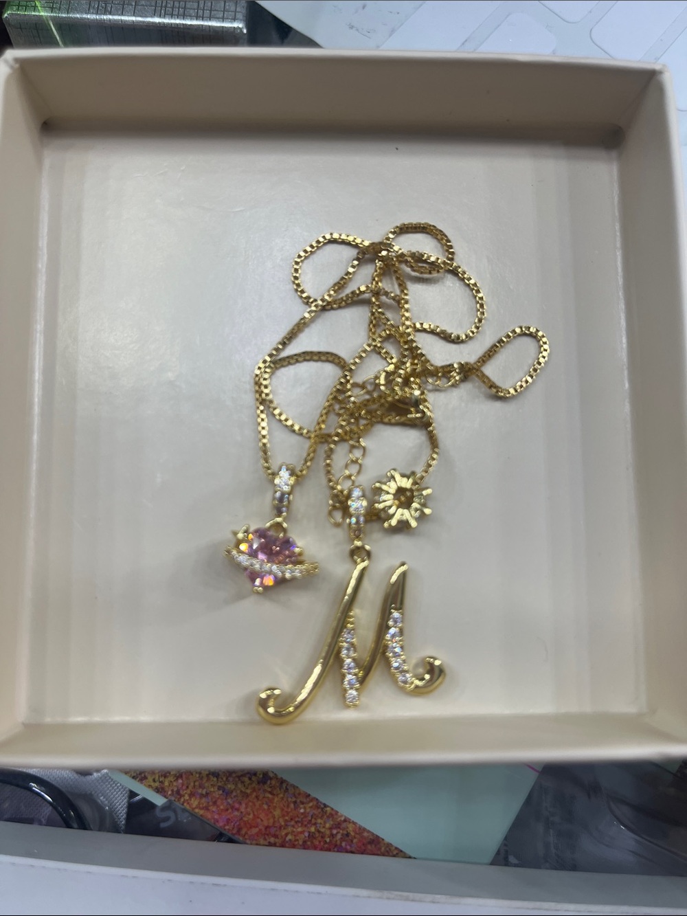 Gold Initial 'M' Necklace with Pink Crystal and Sun Charm